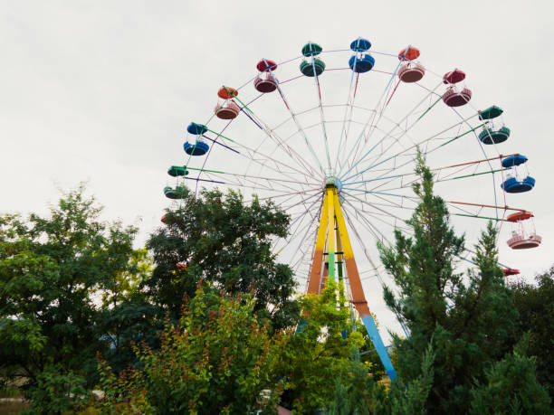 istock Panorama wheel in the forest. abandoned ferris wheel 1784424481