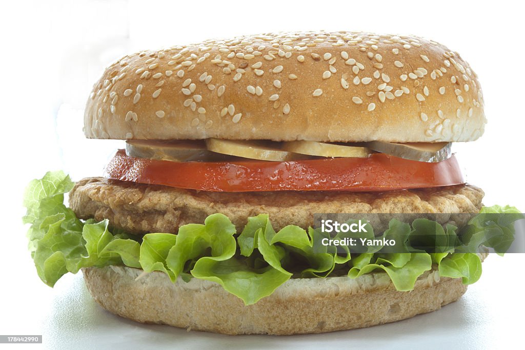 Chicken burger Chicken burger with vegetables , tomato and pickle Burger Stock Photo