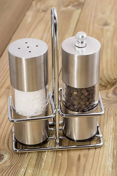 Salt- and Peppershaker on wooden background