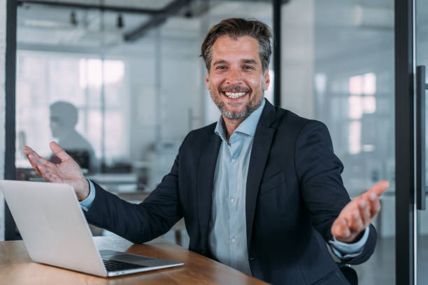 istock Successful businessman in modern office working on laptop. 1784432101