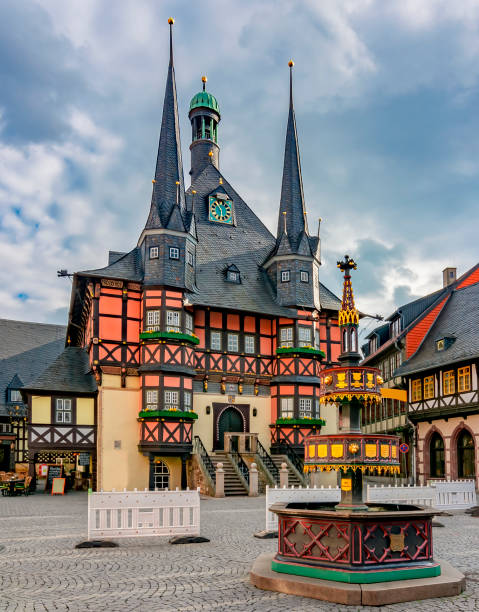 wernigerode town hall on market square, germany - editorial built structure fountain town square imagens e fotografias de stock