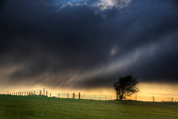 istock Stunning landscape with stormy sky over rural hills 178443654