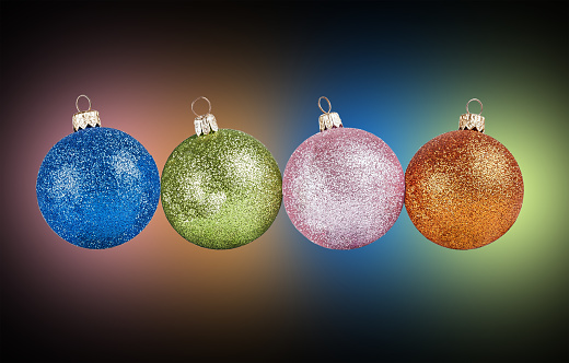 large Christmas tree toys on a dark background