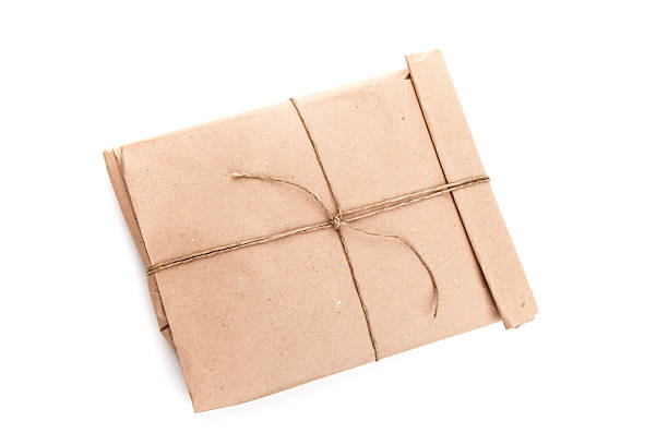 istock Closed envelope tied with rope isolated on white 178444398