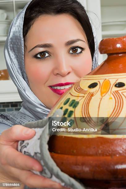 Traditional Tajine Dish Stock Photo - Download Image Now - Adult, Beautiful People, Beautiful Woman