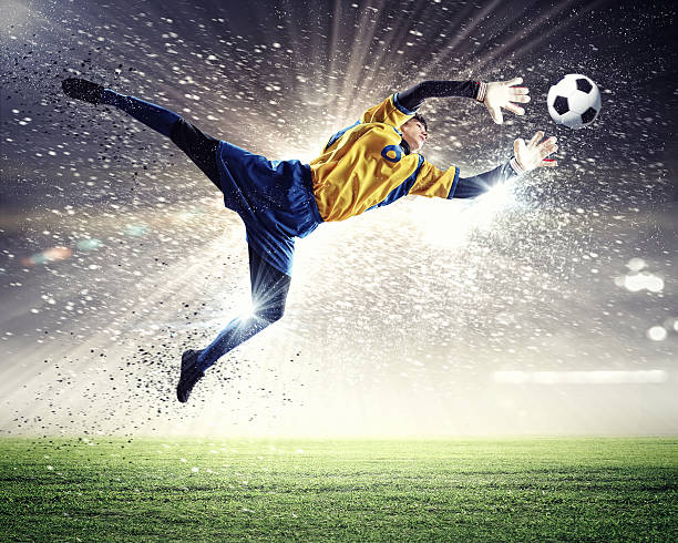 istock Goalkeeper catches the ball 178445462
