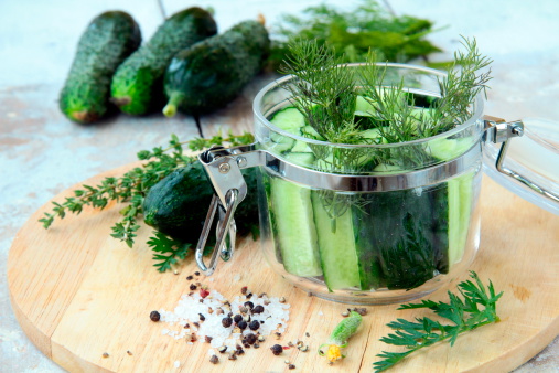 cucumbers in the jar with dill salt and pepper