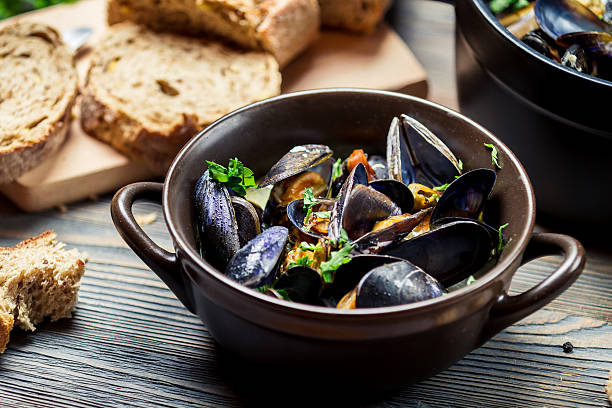 istock Mussels and fresh vegetables served at home 178448018