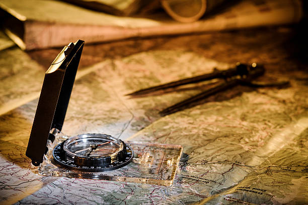 map and compass stock photo