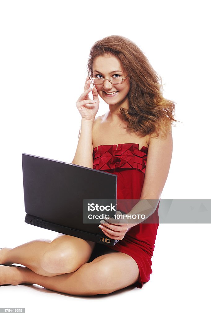 girl with laptop portrait of girl in glasses sitting on white with laptop Adult Stock Photo