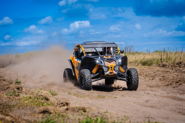 istock UTV buggy and 4x4 offroad in sandy track. Rally extreme riding 1784499313