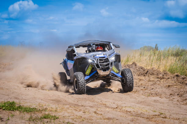 istock UTV in action offroad vehicle racing on sand dune. Extreme, adrenalin. 4x4. 1784499585