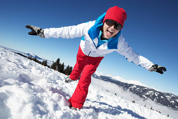 istock Woman Having Fun On Ski Holiday In Mountains 178450679