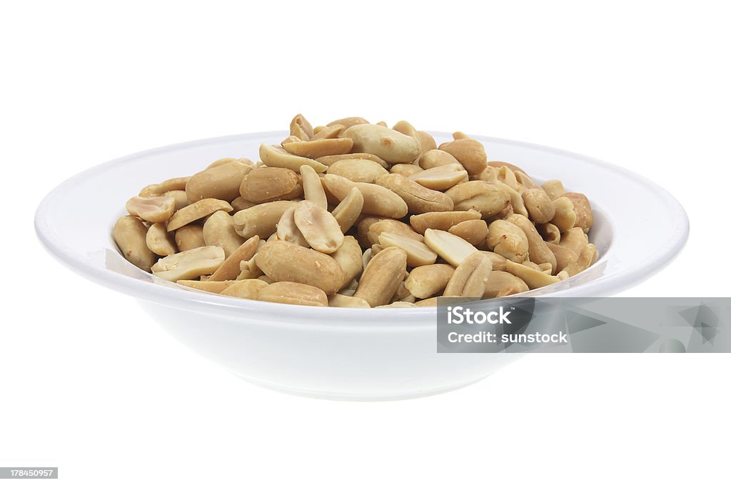 Peanut on Plate Peanut on Plate with White Background Cholesterol Stock Photo