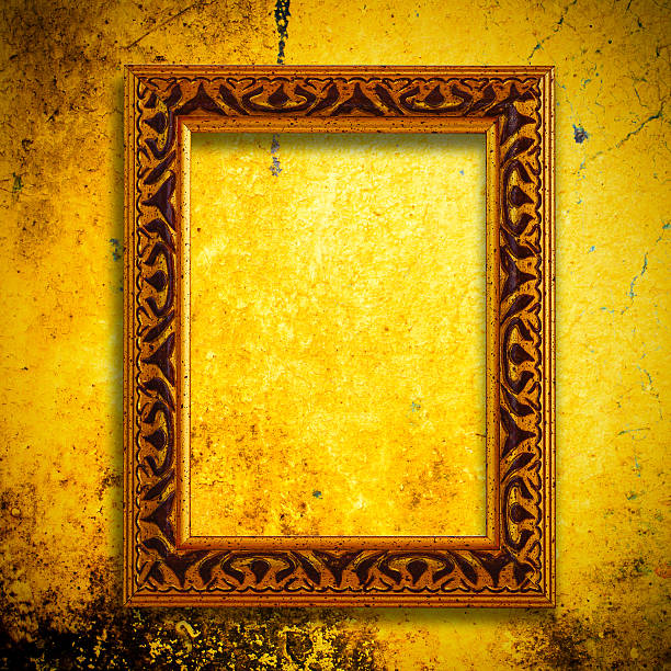 istock Retro wooden frames over gold grunge wallpaper 178451147