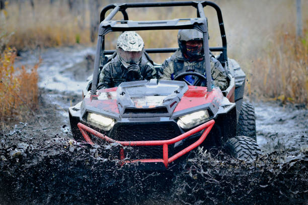 istock Offroad extreme vehicle racing with mud splash. ATV, buggy, quad, UTV, 4x4 1784516132