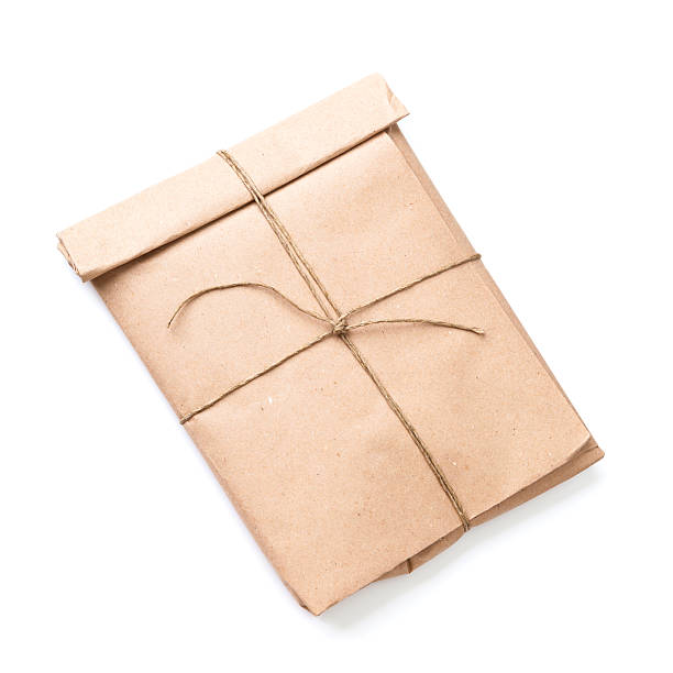 istock Envelope tied with a rope isolated on white 178451860