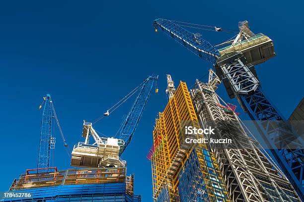 Construction Cranes Stock Photo - Download Image Now - Construction Site, Construction Industry, Building Exterior