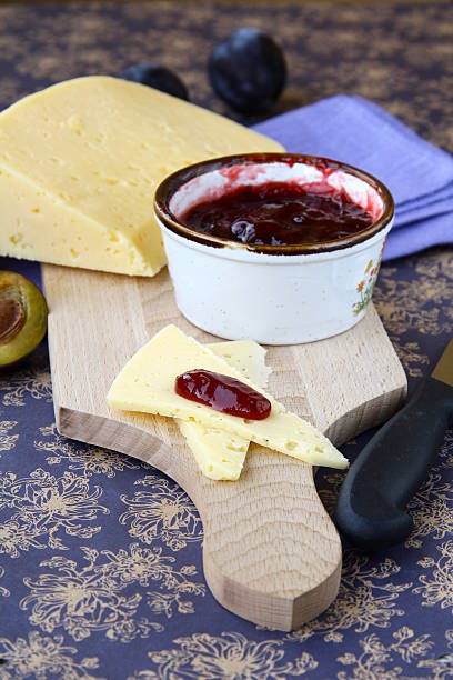 istock jar of plum jam and some slice cheese 178453225