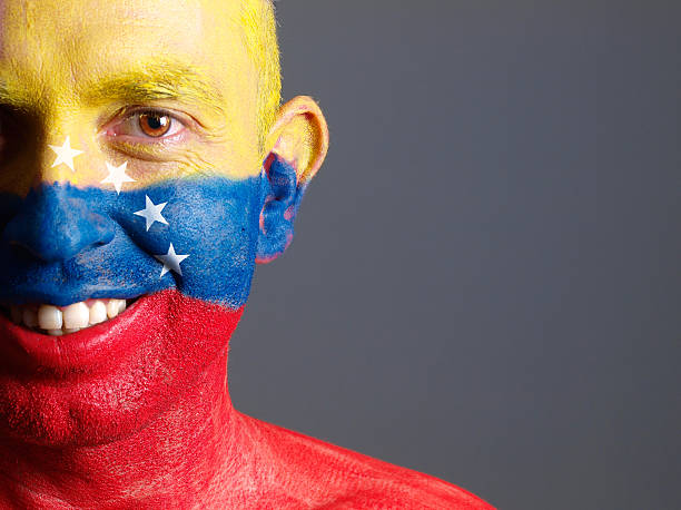istock Man face painted with venezuelan flag, smiling expression 178453335