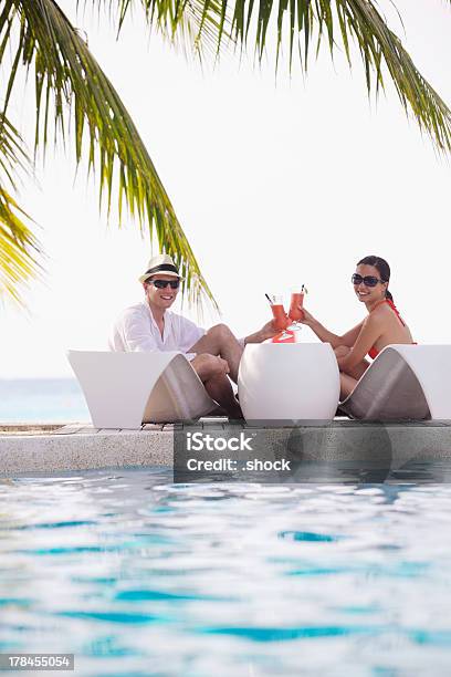 Happy Young Couple Have Fun On Beach Stock Photo - Download Image Now - Adult, Beach, Beautiful People