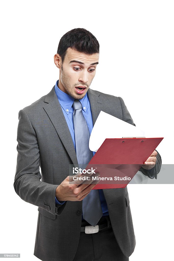 Junger Mann Reading schockierend news - Lizenzfrei Angst Stock-Foto