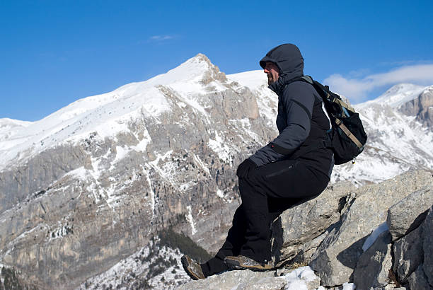 Mountaineer admiring the view after trek