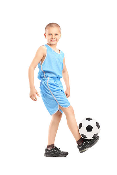 istock Child playing with a soccer ball 178456755
