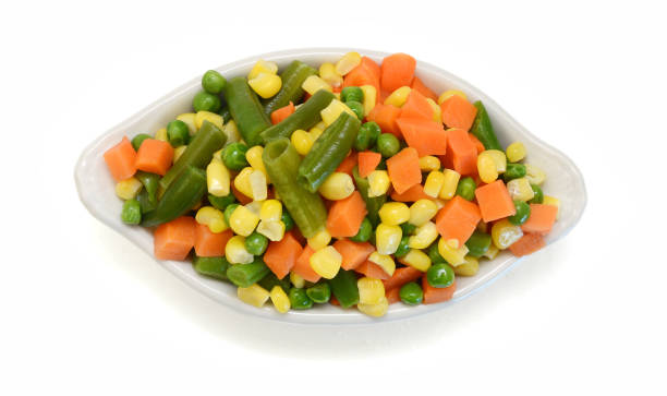 istock Fresh mixed vegetables on white. Golden mix. 1784568746