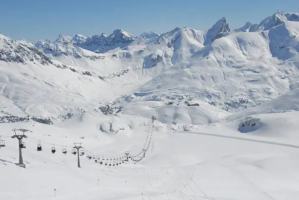 Winterlandscape in Austria, Arlberg, chairlift from zürser lake to Madloch