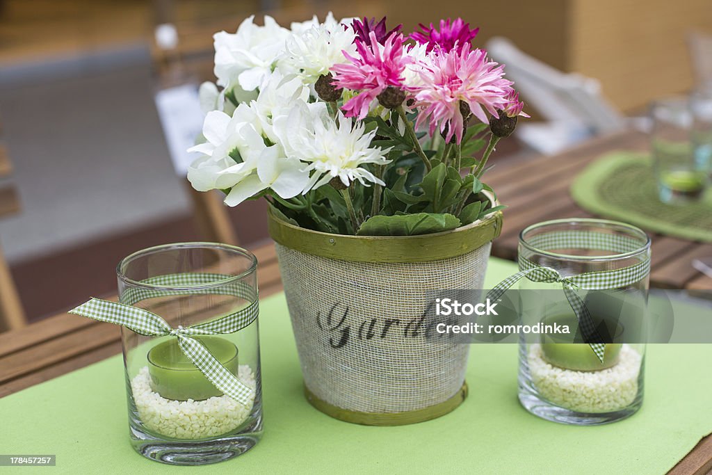 decoration of summer garden table decoration of summer garden table with flowers in vase Arrangement Stock Photo