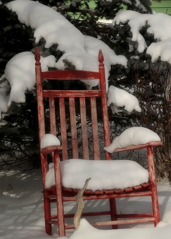 snow-covered garden furniture on the terrace