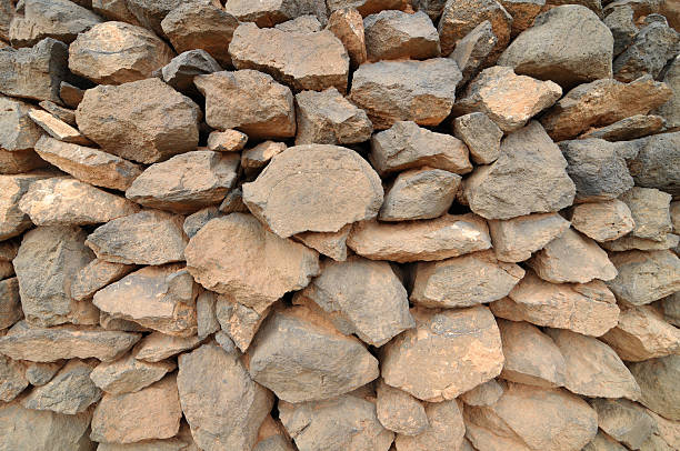 istock Brick wall made of rocks 178457874