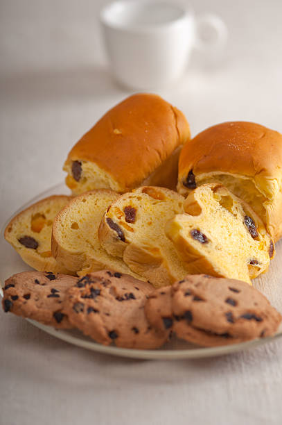 Paris, France: Fresh-Baked Raisin Buns on Bakery Tray in Window