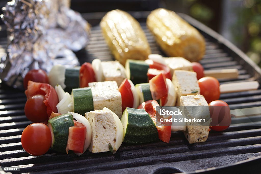 Food: Vegetarian Barbecue, vegetables and tofu kebabs Vegetarian Barbecue,  marinated vegetables and tofu kebabs on a grill Barbecue - Meal Stock Photo