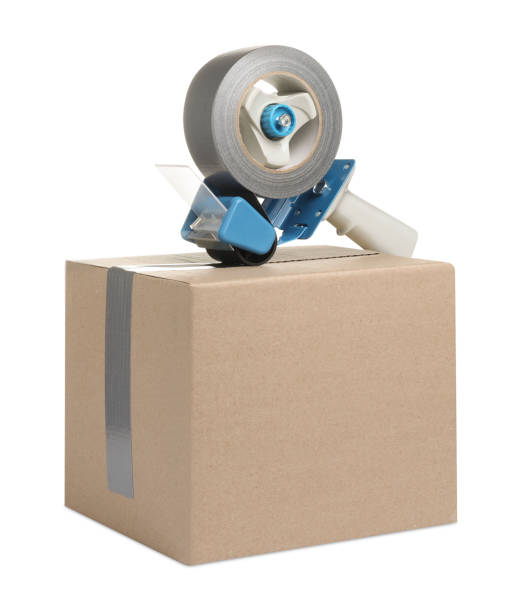 istock Dispenser with roll of adhesive tape on box against white background 1784592323