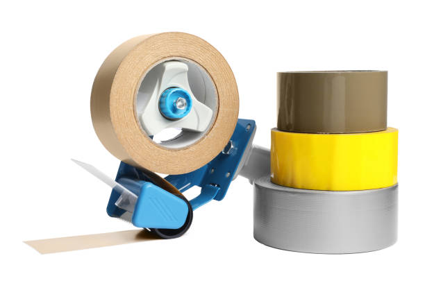 istock Dispenser and rolls of adhesive tape on white background 1784592840