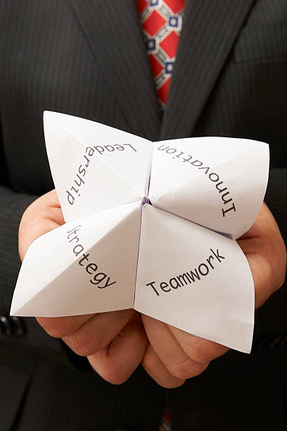 istock businessman and origami 178459806
