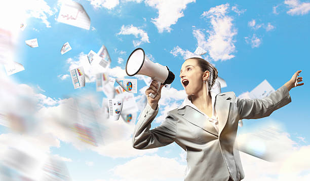 istock businesswoman with megaphone 178460228