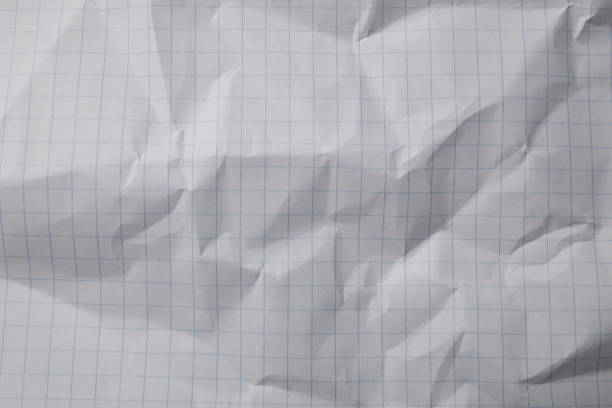 istock Crumpled sheet of paper as background, top view 1784602649