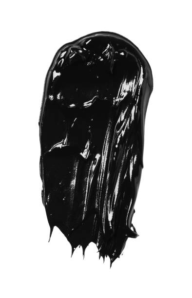 istock Smear of black glossy paint on white background, top view 1784603192