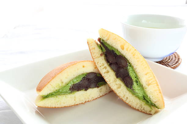 macha Dorayaki with hot tea on background
