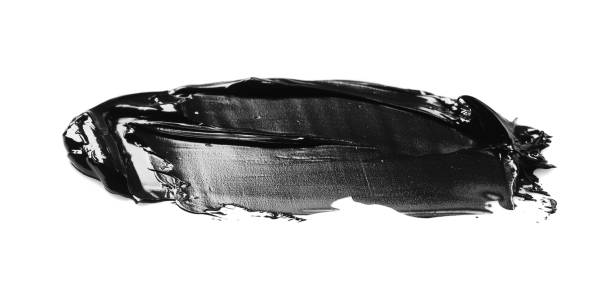 istock Smear of black glossy paint on white background 1784604233
