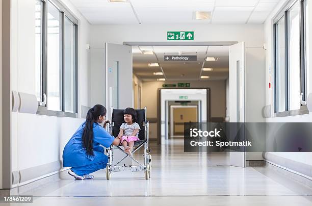 Female Girl Child Patient In Wheelchair Hospital Nurse Stock Photo - Download Image Now