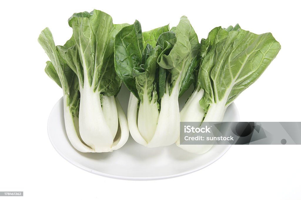 Baby Bok Choy Baby Bok Choy on White Background Baby Bok Choy Stock Photo