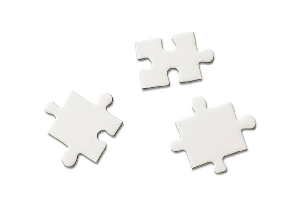 tre pezzi di puzzle bianco - isolated against white foto e immagini stock