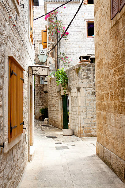 istock View on narrow alley - Trogir, Croatia. 178462158