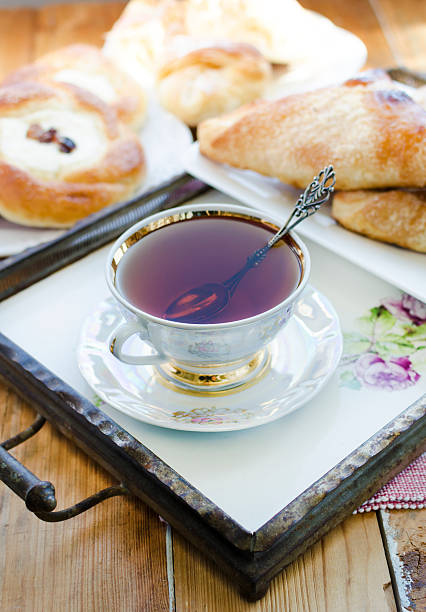 istock Cheese and raisins buns, apple pastries, cup of Tea. 178462662