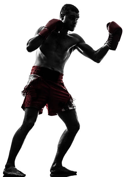 istock one man exercising thai boxing silhouette 178462744