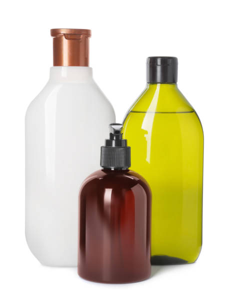 istock Different bottles of shampoo on white background 1784628613